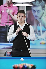 Image showing young man play pro billiard game 