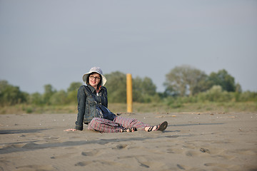 Image showing happy young woman on beach