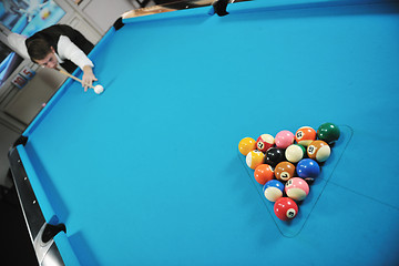 Image showing young man play pro billiard game 