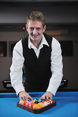 Image showing young man play pro billiard game 