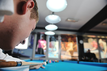 Image showing young man play pro billiard game 