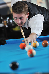 Image showing young man play pro billiard game 