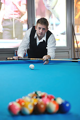 Image showing young man play pro billiard game 