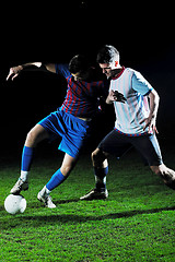 Image showing football players in competition for the ball