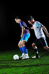 Image showing football players in competition for the ball