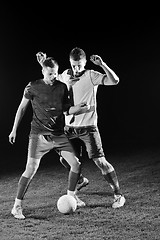 Image showing football players in competition for the ball