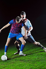 Image showing football players in competition for the ball