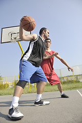 Image showing streetball  game at early morning