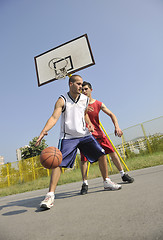 Image showing streetball  game at early morning