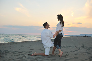 Image showing happy young couple have fun on beach