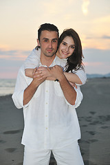 Image showing happy young couple have fun on beach