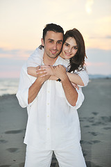 Image showing happy young couple have fun on beach