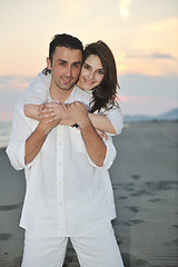 Image showing happy young couple have fun on beach