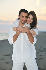 Image showing happy young couple have fun on beach