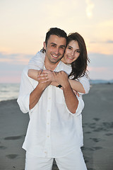 Image showing happy young couple have fun on beach