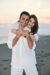 Image showing happy young couple have fun on beach