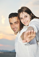 Image showing happy young couple have fun on beach