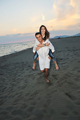 Image showing happy young couple have fun on beach