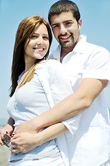 Image showing happy young couple have fun on beach