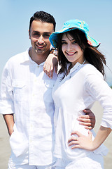 Image showing happy young couple have fun on beach