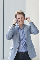 Image showing young business man talk by cellphone