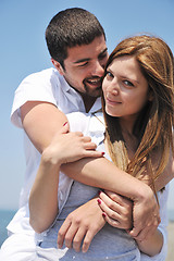 Image showing happy young couple have fun on beach