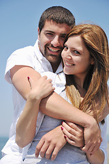 Image showing happy young couple have fun on beach