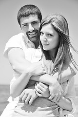 Image showing happy young couple have fun on beach