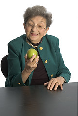 Image showing woman eating an apple