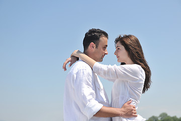 Image showing happy young couple have fun on beach