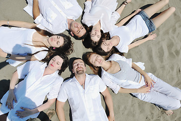 Image showing Group of happy young people in have fun at beach