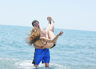 Image showing happy young couple have romantic time on beach