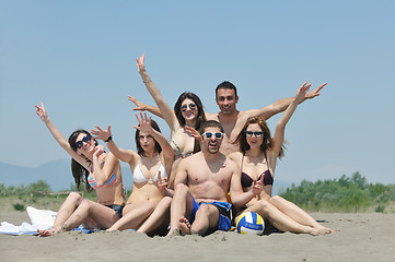 Image showing Group of happy young people in have fun at beach