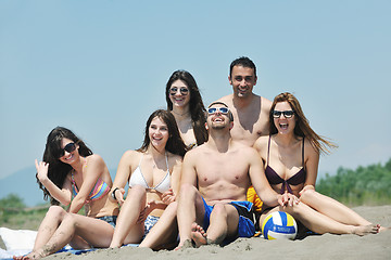 Image showing Group of happy young people in have fun at beach