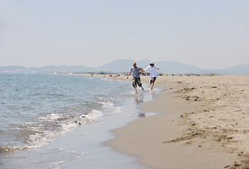 Image showing happy young couple have fun on beach