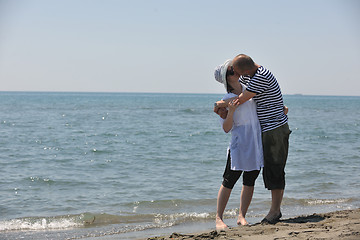 Image showing happy young couple have fun on beach