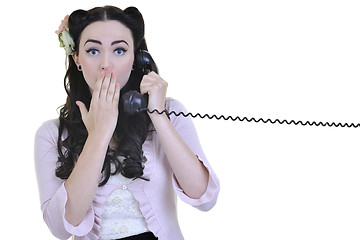 Image showing pretty girl talking on old phone