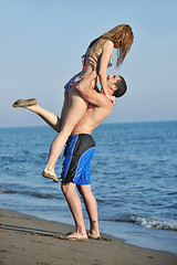 Image showing happy young couple have romantic time on beach