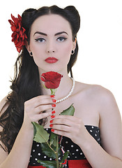 Image showing young woman with rose flower isolated on white