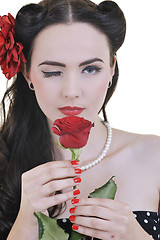 Image showing young woman with rose flower isolated on white