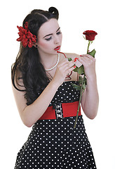 Image showing young woman with rose flower isolated on white