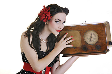 Image showing pretty girl listening music on  radio