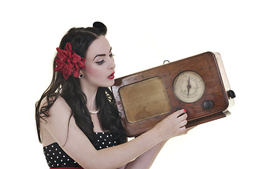 Image showing pretty girl listening music on  radio