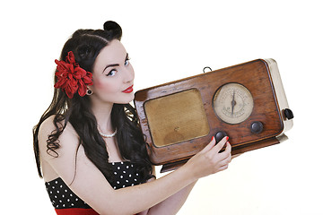 Image showing pretty girl listening music on  radio