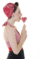 Image showing pretty young happy woman with travel bag waiting and posing isol