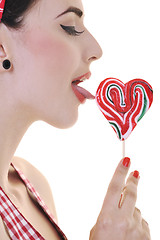 Image showing happy woman with lollipop isolated on white 