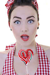 Image showing happy woman with lollipop isolated on white 