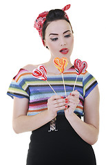 Image showing happy woman with lollipop isolated on white 