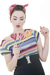 Image showing pretty young happy woman with travel bag waiting and posing isol