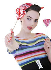 Image showing happy woman with lollipop isolated on white 